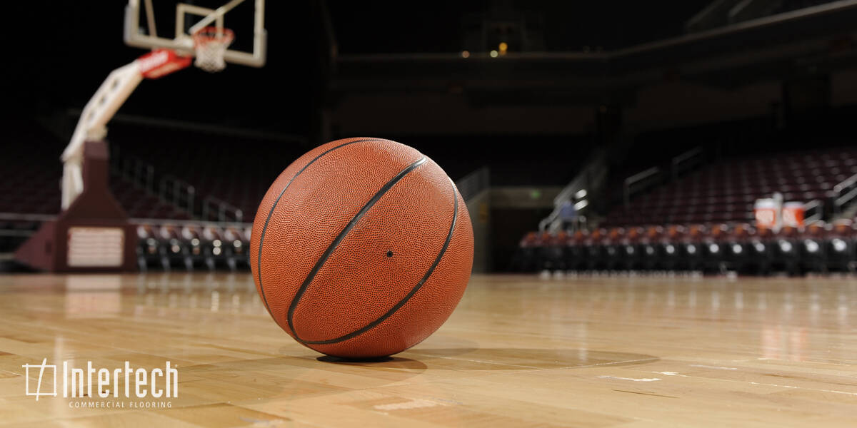 image of a basketball on a basketball court wooden floor sports flooring